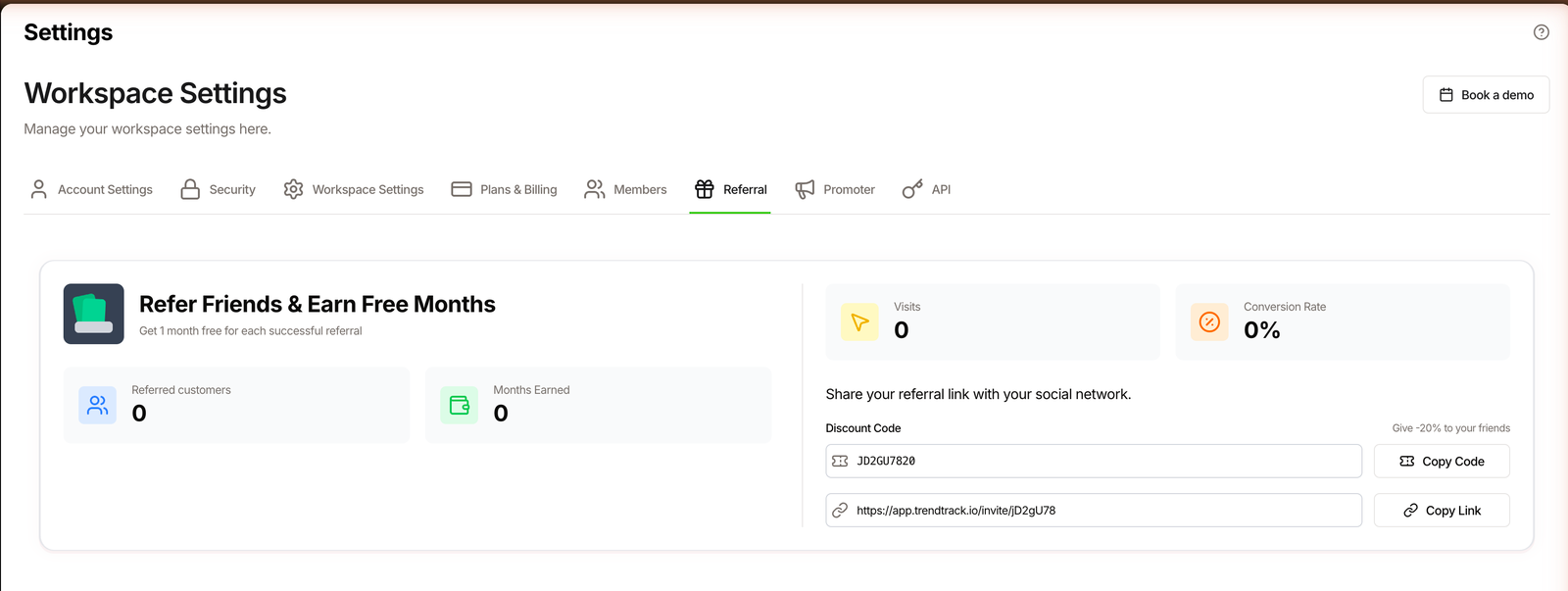 TrendTrack referral settings showing a shareable discount code, an invite link and a 1 month free reward per referral